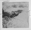 Boy lying on the ground