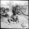 "Gao Helmet" hammering and shaping an assegai blade with a piece of metal