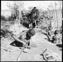 "Gao Helmet" hammering and shaping an assegai blade with a piece of metal