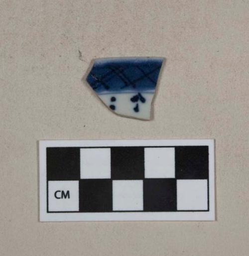 Blue on white hand painted porcelain vessel rim fragment, white paste