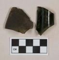 Olive green glass vessel fragments, 1 heavily weathered