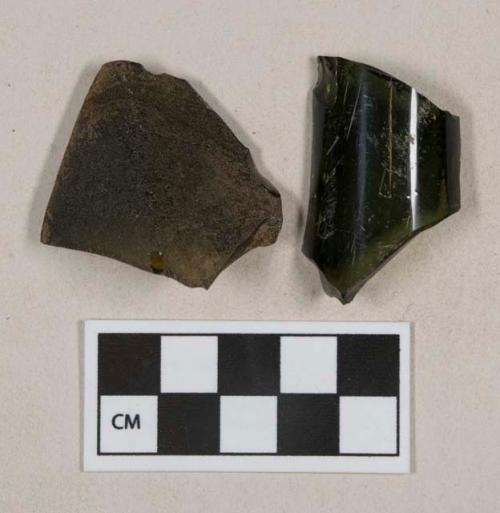 Olive green glass vessel fragments, 1 heavily weathered