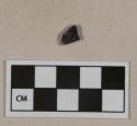 Black lead glazed redware vessel fragment, possibly jackfield type