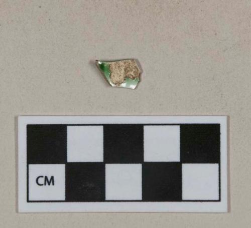 Green shell edged pearlware vessel rim fragment, white paste