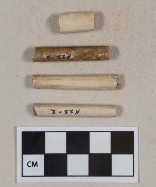 White undecorated kaolin pipe stem fragments, 1 pipe bowl fragment, 1 stem with 6/64" bore diameter, 3 stems with 5/64" bore