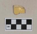 Undecorated yellowware vessel body fragment, buff paste