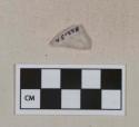 Colorless glass vessel fragment, perhaps stemware base fragment