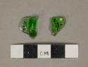 Bright green glass vessel fragments, 1 bottle finish fragment