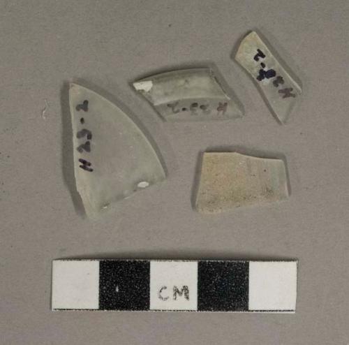 Colorless glass fragments, 1 possible stemware base fragment