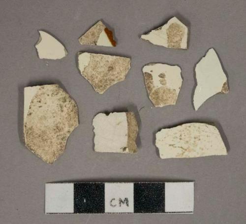 Creamware vessel body fragments, light buff paste, 1 fragment with reddish brown decoration