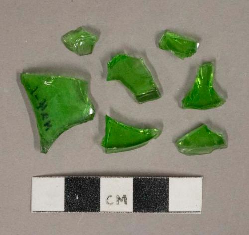 Bright green glass vessel fragments