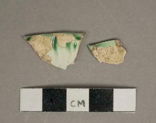 Green shell-edged pearlware vessel rim fragments, white paste