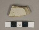 Undecorated gray salt glazed stoneware vessel body base fragment, gray paste