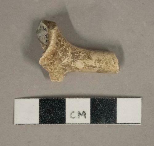 White undecorated kaolin pipe stem fragment with portion of bowl and foot fragment, 5/64" bore diameter