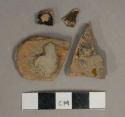 Brown lead glazed redware vessel body fragments, 1 fragment possibly burned or waster