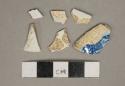 Blue on white transferprinted pearlware vessel fragments, white paste