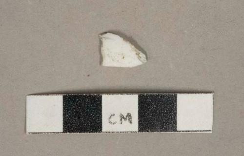 Undecorated white milk glass vessel fragment