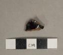 Black lustrous lead glazed redware vessel fragment