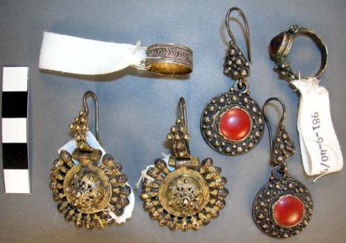 Pair of earrings of gold-colored metal. pendant circles with filigree +