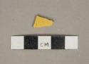 Yellow lead glazed earthenware vessel body fragment, buff paste