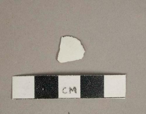 Undecorated whiteware vessel fragment, white paste