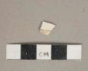 Undecorated whiteware vessel fragment, white paste