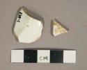 White undecorated ironstone vessel body fragments, white paste