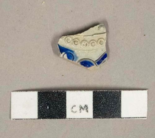 Gray salt glazed stoneware vessel body fragment, gray paste, cobalt decorated, molded decoration