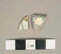 Polychrome handpainted whiteware vessel body fragments, white paste, likely burned