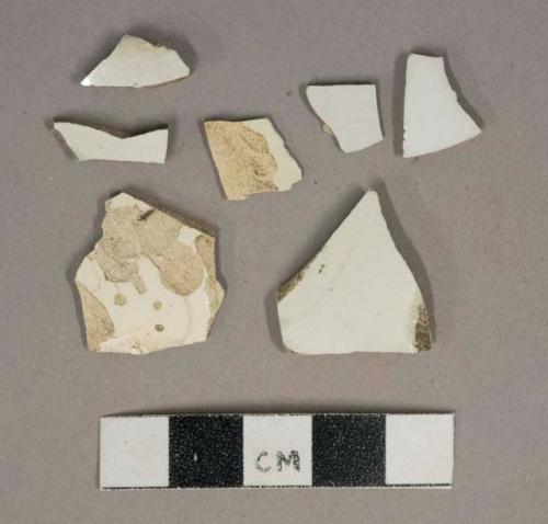 Undecorated whiteware vessel body fragments, white paste