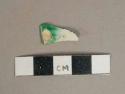 Green on white shell-edged pearlware vessel rim fragment, white paste