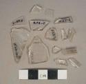 Colorless glass vessel fragments, 4 tube fragments