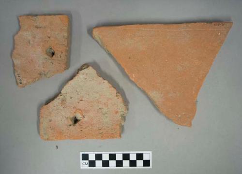 Red ceramic rooftile fragments, 2 with nail holes