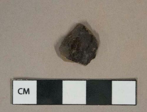 Black lead glazed grayish redware vessel body fragment, possibly jackfield type