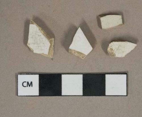 White undecorated ironstone vessel body fragments, white paste