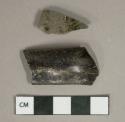 Black lead glazed earthenware vessel body and handle fragments, gray paste, possibly Jackfield type