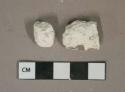 White plaster fragments