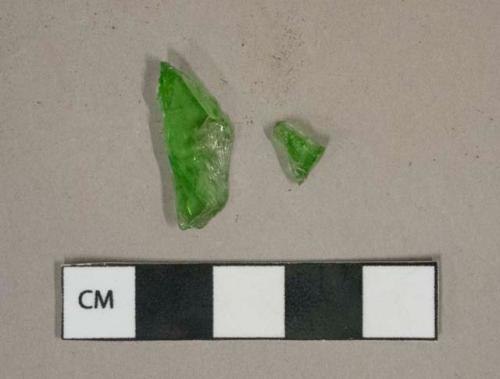 Bright green glass vessel fragments