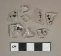 Colorless glass vessel body fragments, 2 fragments with embossed decoration