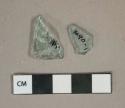 Aqua glass vessel fragments, 1 fragment with embossed decoration