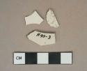 Undecorated white salt-glazed stoneware vessel body fragments, white paste