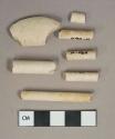 White undecorated kaolin pipe bowl and stem fragments, 1 stem fragment with 4/64" bore diameter, 3 stem fragments with 5/64" bore diameter, 1 stem with 6/64" bore diameter