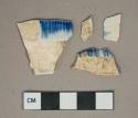 Blue on white shell-edged pearlware vessel body and rim fragments, white paste