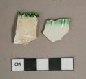 Green on white shell-edged pearlware vessel rim fragments, white paste
