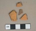 Unglazed undecorated redware vessel body fragments, likely terra cotta