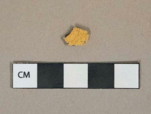 Yellow lead glazed earthenware vessel body fragment, buff paste