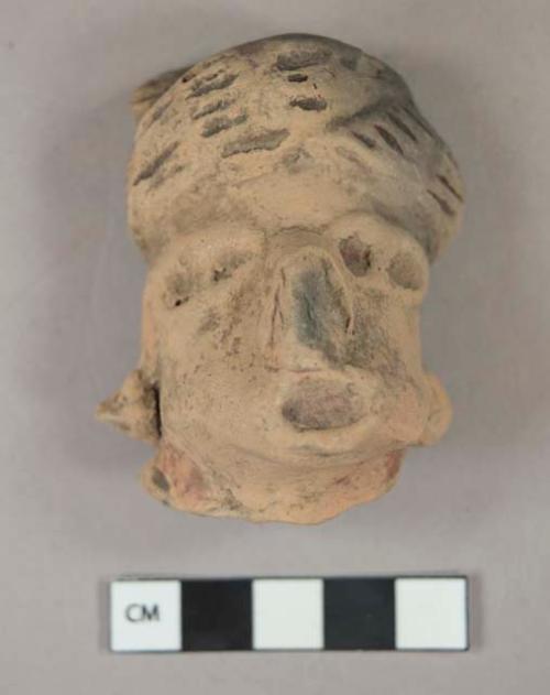 Large pottery figurine head with turban