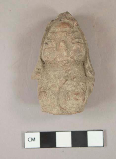 Pottery figurine head and chest