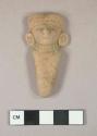 Head and body of a small jointed pottery figurine