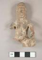 Broken pottery figurine -- sitting position